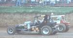 Ray Crawford and Kenny Stidd on the front row of a heat race at Amarillo